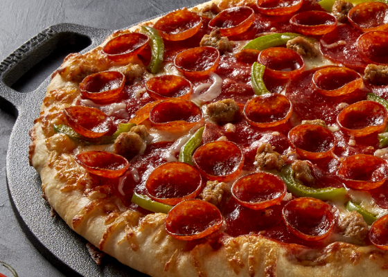 Image of new Hillshire Farm® Cupping Pepperoni topping our Artisanal Meat Trio Pizza recipe.